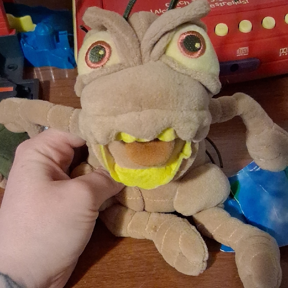 Disney Tan and Yellow Reptile Plush